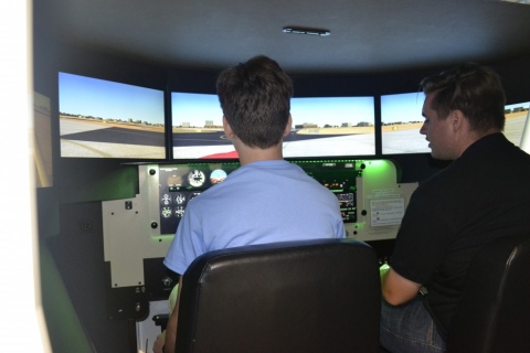 Filip Flying the Redbird Flight Simulator 