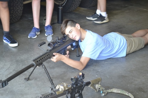 Alessandro tries out military firepower 