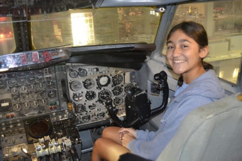Isabella in a Jet cockpit 